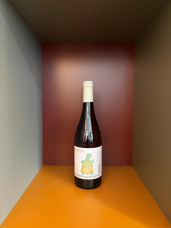 Orange wine bottle with cream label and green illustration, white cap