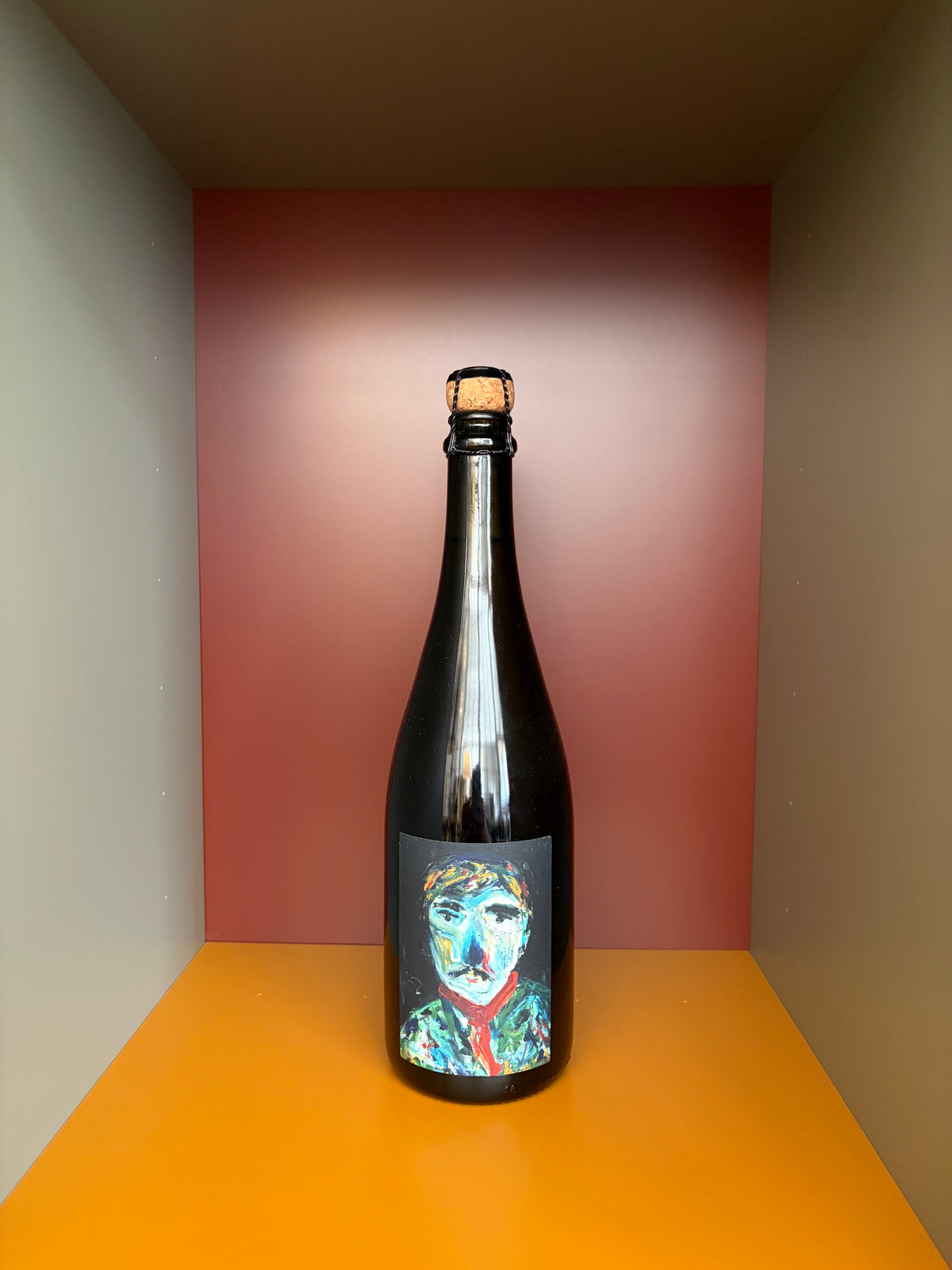 Naboso sparkling wine bottle in dark glass with holographic portrait label