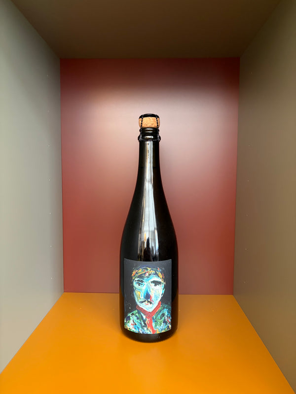 Naboso sparkling wine bottle in dark glass with holographic portrait label