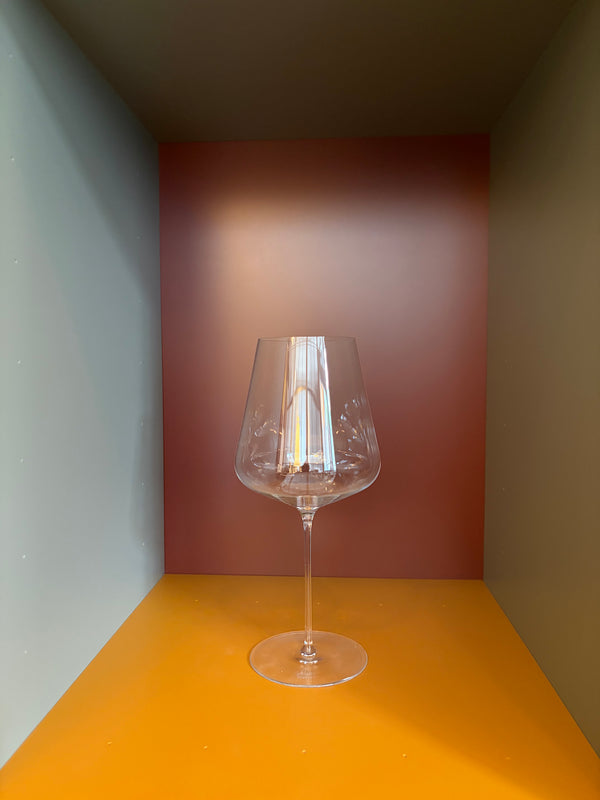 Burgundy wine glass, clear crystal with faceted bowl and slender stem
